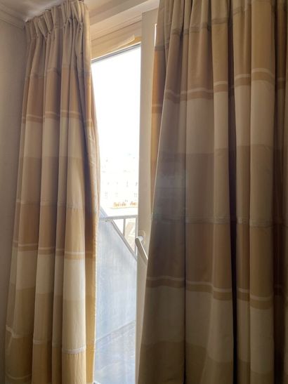 Three pairs of curtains in yellow striped...