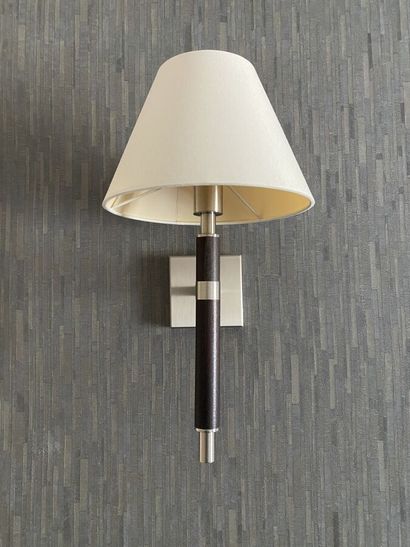 Suite of three sconces in chromed metal and...