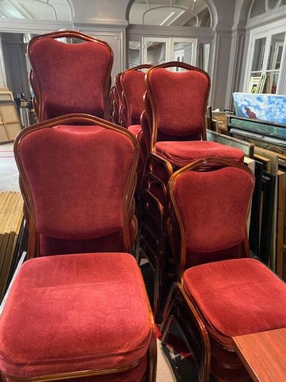 50 conference chairs upholstered in burgundy...