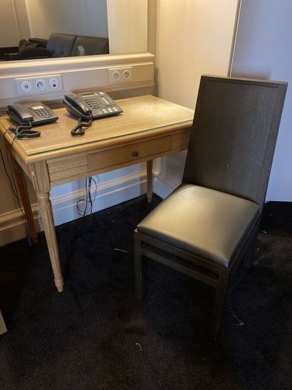 Small desk in natural wood opening to a drawer,...