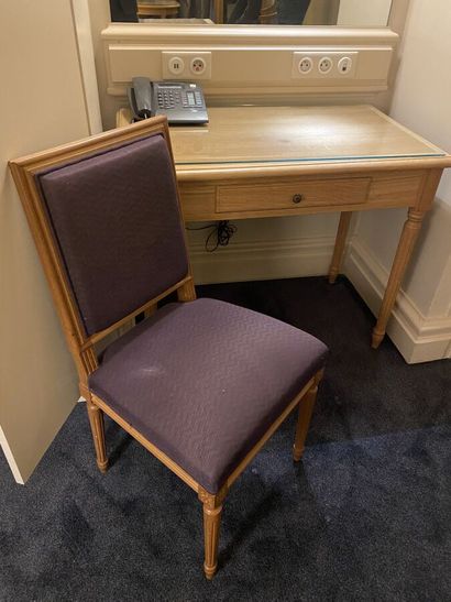 Small desk in natural wood opening on a drawer,...