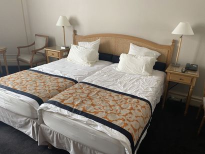 Double bed composed of two box springs and...