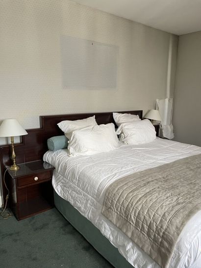 Double bed composed of two box springs and...