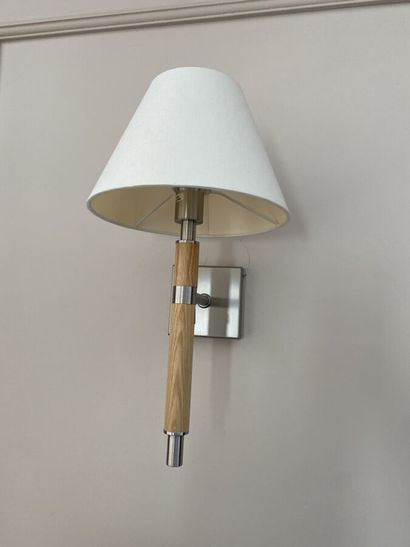 Suite of three sconces in chromed metal and...