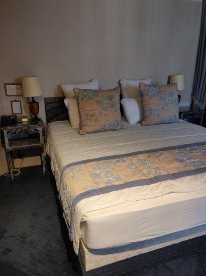 Double bed with wooden headboard, white and...
