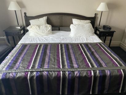 Double bed composed of two box springs and...