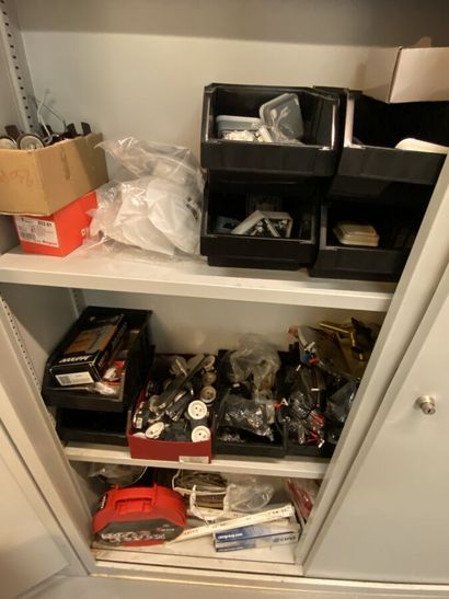 4 metal cabinets and their contents of hardware...