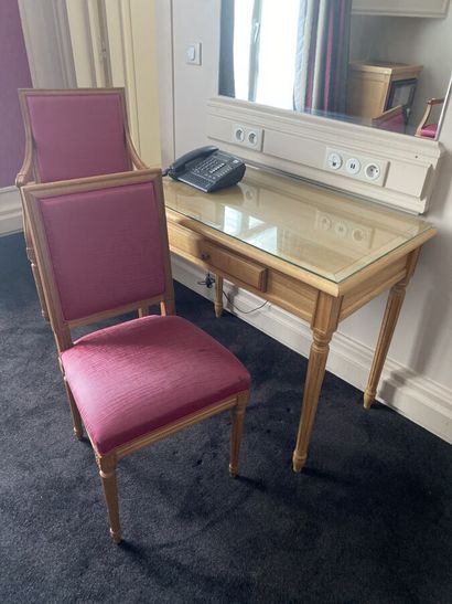 Small desk in natural wood opening to a drawer,...