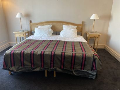Double bed composed of two box springs and...