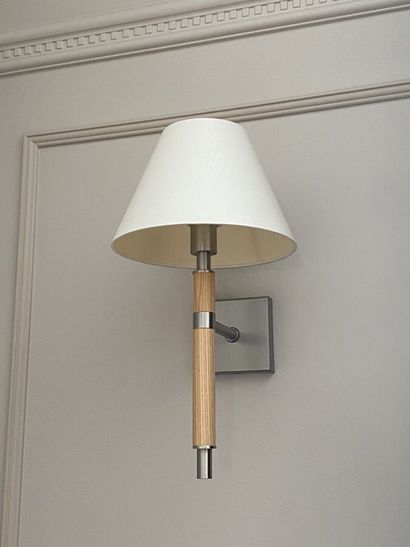 Suite of three sconces in chromed metal and...
