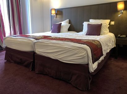 Two single beds each on a box spring.

 200...