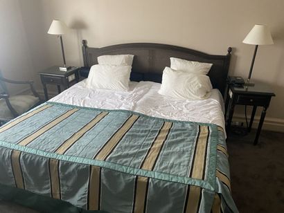 Double bed composed of two box springs and...