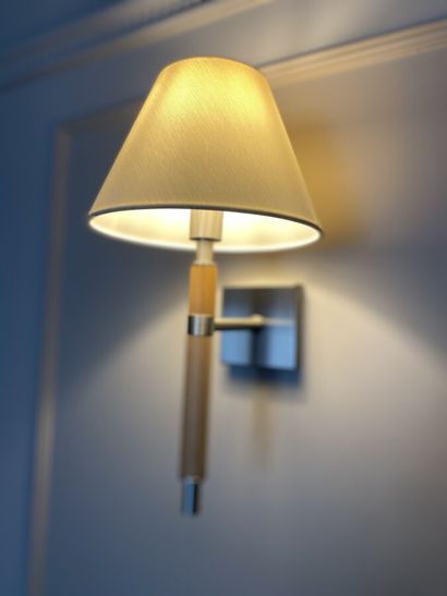 Suite of five sconces in chromed metal and...