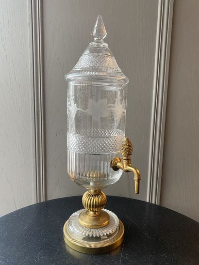 Fountain in gilded metal and glass engraved...
