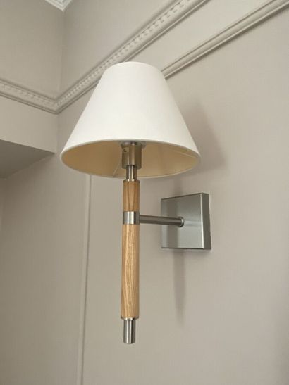 Suite of three sconces in chromed metal and...