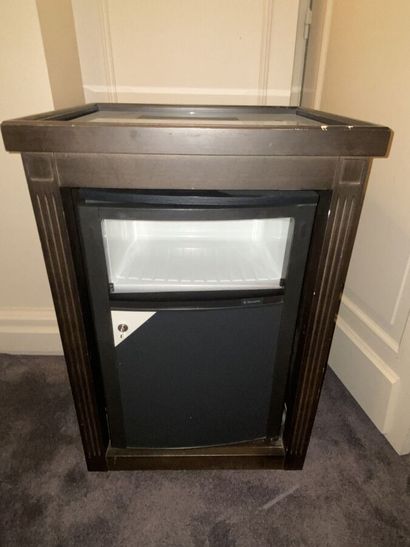 Dark wood mini-bar with fluted uprights in...