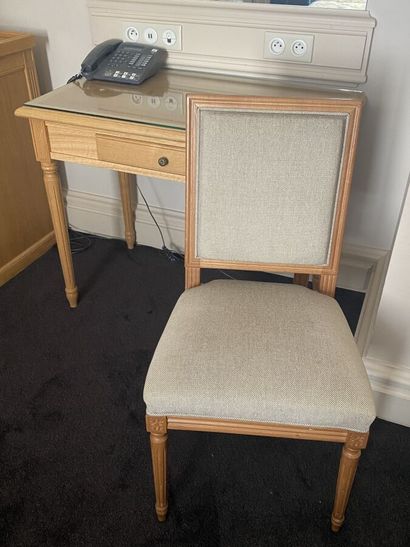 Small desk in natural wood opening on a drawer,...