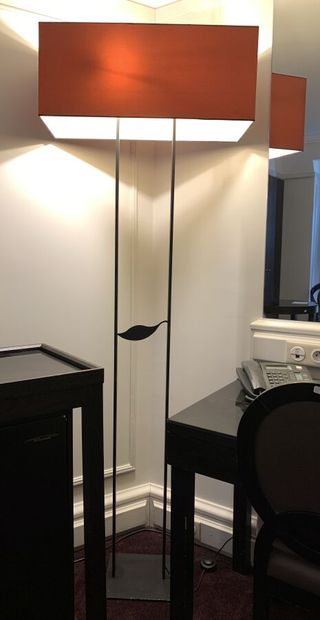 Floor lamp with two amounts joined by a sheet,...