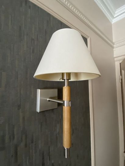 Suite of three sconces in chromed metal and...