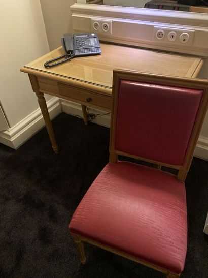 Small desk in natural wood opening on a drawer,...