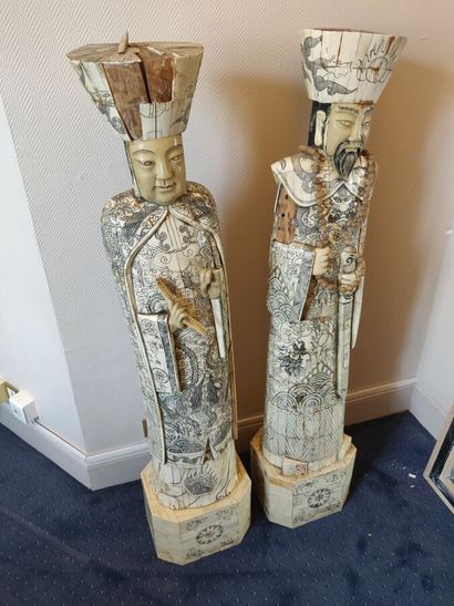 Pair of sculptures decorated with Chinese...