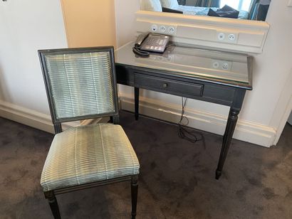 Small desk in natural wood opening to a drawer,...