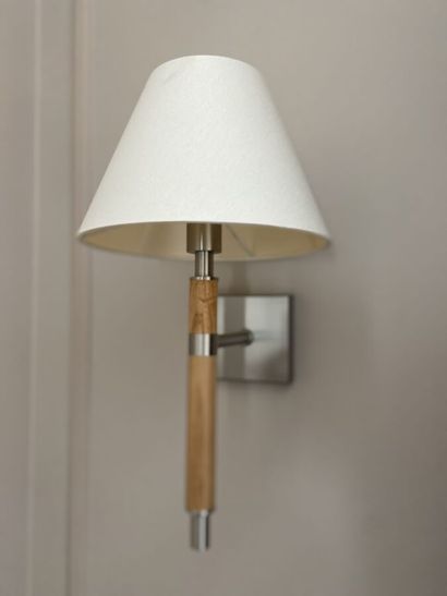 Suite of three sconces in chromed metal and...