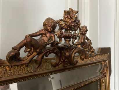 
Large wooden and stucco gilded mirror with...