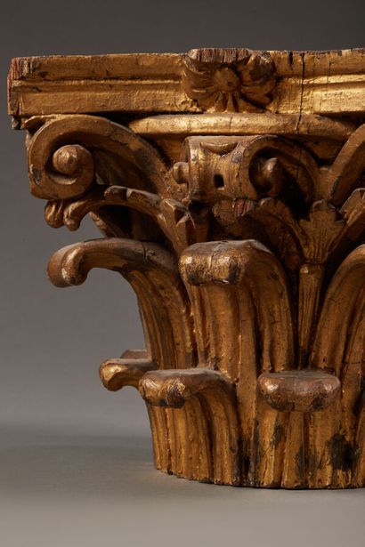 Set of four Corinthian capitals in gilded...