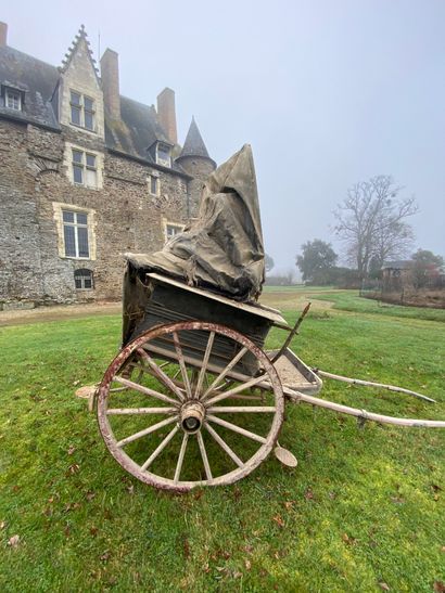 Carriage on horseback. Hub inscribed 