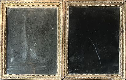 Pair of rectangular frames in carved and...