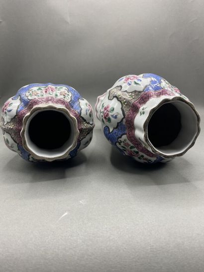 Pair of covered potiches with gadrooned sides...