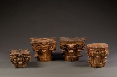 Set of four Corinthian capitals in gilded...