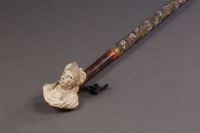 Large turned wood pipe, decorated with a...