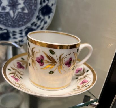 Porcelain cup with polychrome and gilded...
