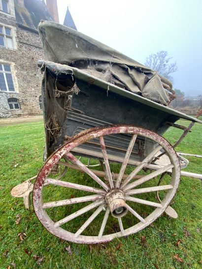 Carriage on horseback. Hub inscribed 