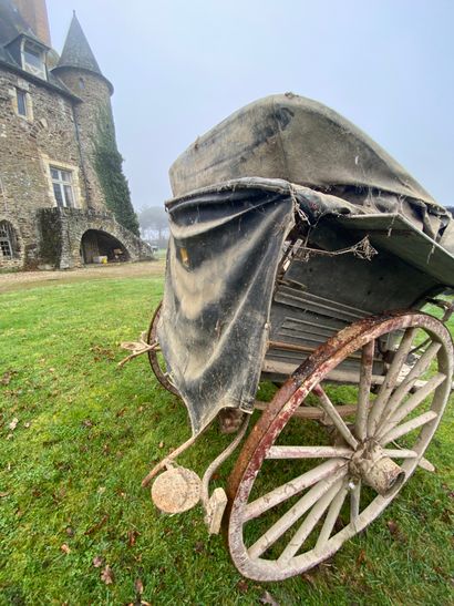 Carriage on horseback. Hub inscribed 