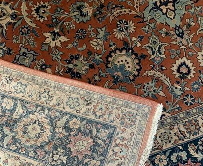 Large oriental carpet with orange background,...