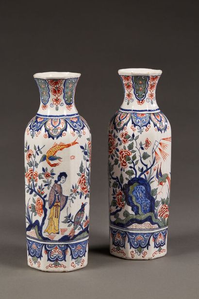 Pair of octagonal vases with flared necks...