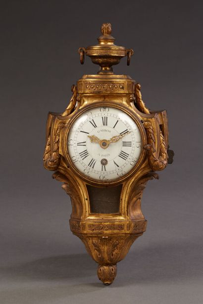 Gilt bronze and chiseled wall clock decorated...