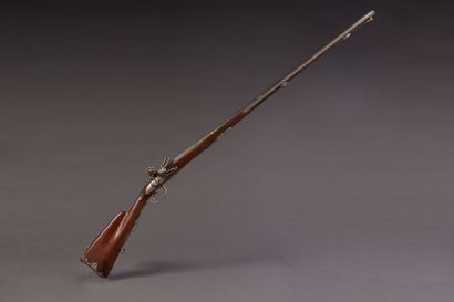 Double flintlock shotgun. 
Round barrels...