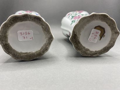Pair of covered potiches with gadrooned sides...
