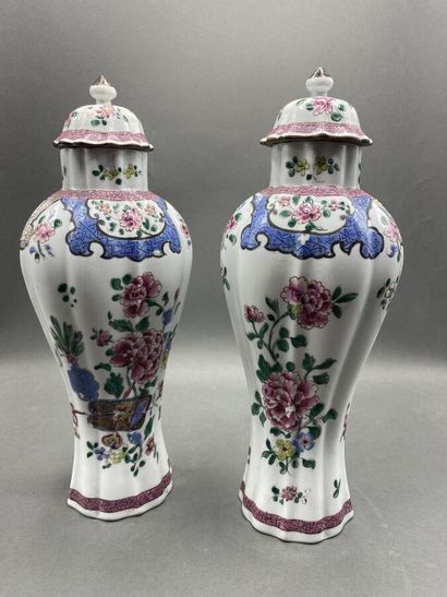 Pair of covered potiches with gadrooned sides...