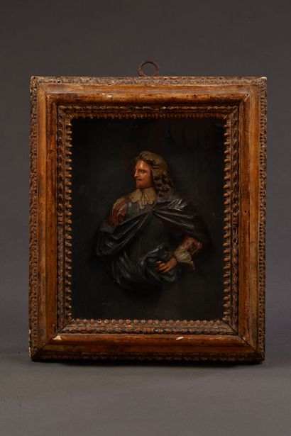 Wax on slate representing a musketeer in...