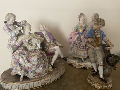 Three statuettes in painted porcelain (two...
