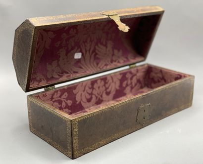 Gilded leather case with small irons opening...