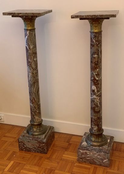 Pair of marble columns, bronze ornaments.

Height...