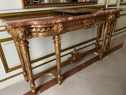 
Wooden console and carved and gilded medium...