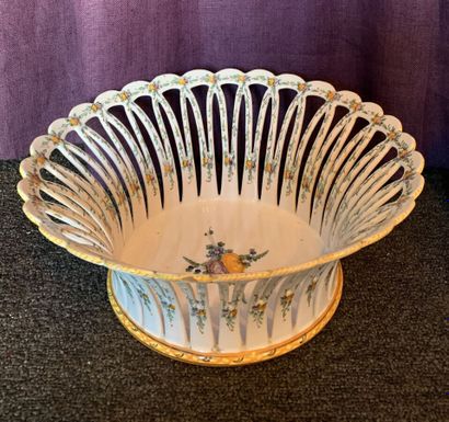 Basket with fruits in openwork earthenware....