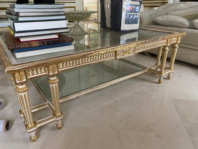 
White and gilded carved wood coffee table,...